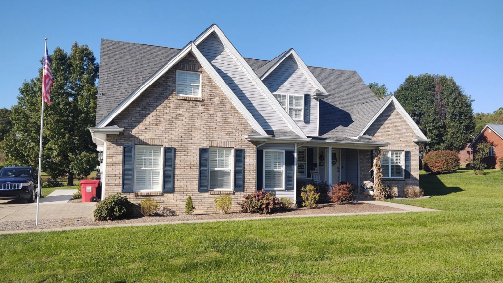 Frontside of house showing completed roof repair